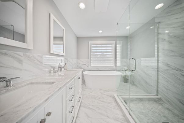 Bathroom, Dual Sink Vanities, Free Standing Baths, Glass Shower, Interior, Marble, Marble Walls, Recessed Lighting