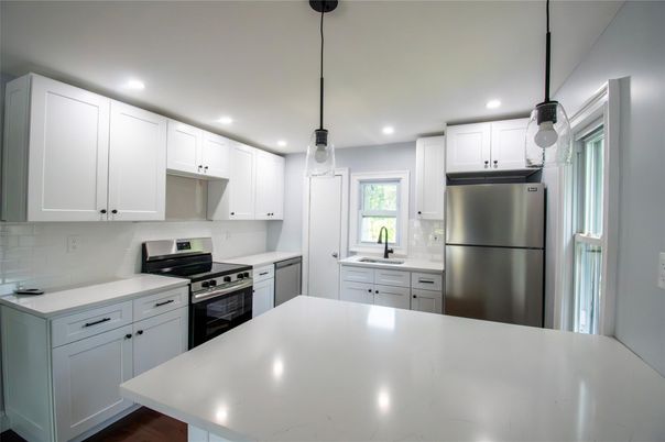 Interior, Kitchen, Pendant Lights, Recessed Lighting, Stainless Steel Appliances, Wood Texture Flooring