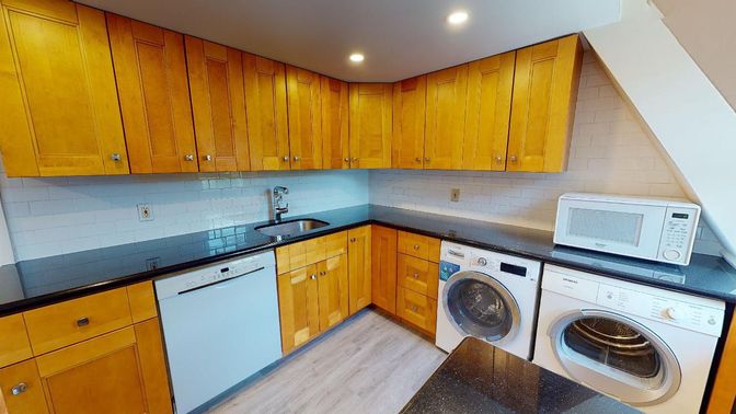 Interior, Kitchen, Recessed Lighting, Washer, Wood Texture Flooring
