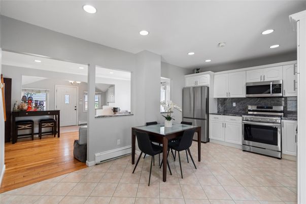 Dining room, Interior, Kitchen, Recessed Lighting, Stainless Steel Appliances, Wood Texture Flooring