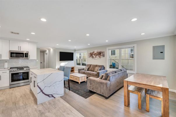 Dining room, Interior, Kitchen, Living room, Recessed Lighting, Stainless Steel Appliances, Wood Texture Flooring