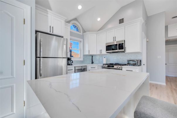Interior, Kitchen, Recessed Lighting, Stainless Steel Appliances, Wood Texture Flooring