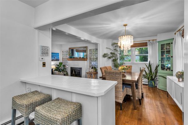 Chandelier, Dining room, Fireplace, Interior, Wood Texture Flooring