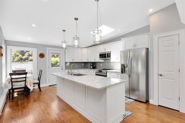 Dining room, Interior, Kitchen, Pendant Lights, Recessed Lighting, Stainless Steel Appliances, Wood Texture Flooring