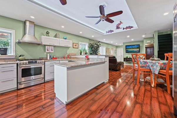 Dining room, Interior, Kitchen, Recessed Lighting, Stainless Steel Appliances, Wood Texture Flooring