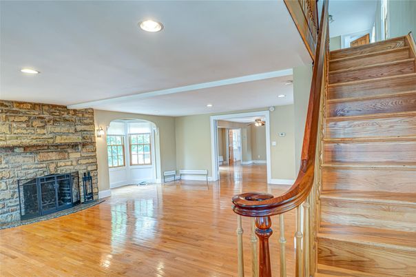 Fireplace, Interior, Recessed Lighting, Stone Walls, Wood Texture Flooring