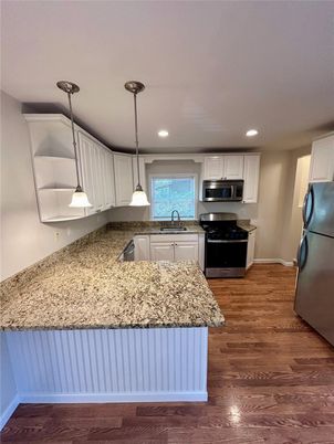 Interior, Kitchen, Pendant Lights, Recessed Lighting, Stainless Steel Appliances, Wood Texture Flooring