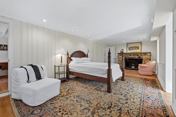 Bedroom, Fireplace, Interior, Recessed Lighting, Wood Texture Flooring