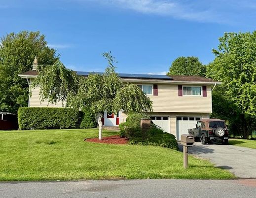 Attached, Exterior, Facade, Solar Panels, Raised Ranch
