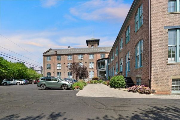 Exterior, Facade, Brick Facade, Condo Building