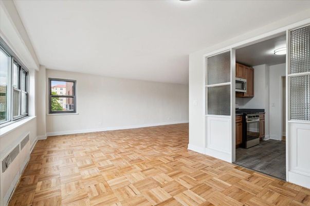 Empty room, Interior, Kitchen, Stainless Steel Appliances, Wood Texture Flooring