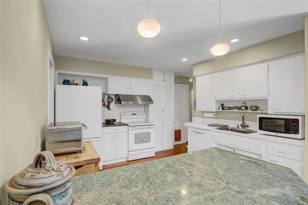 Interior, Kitchen, Pendant Lights, Recessed Lighting, Stainless Steel Appliances, Wood Texture Flooring