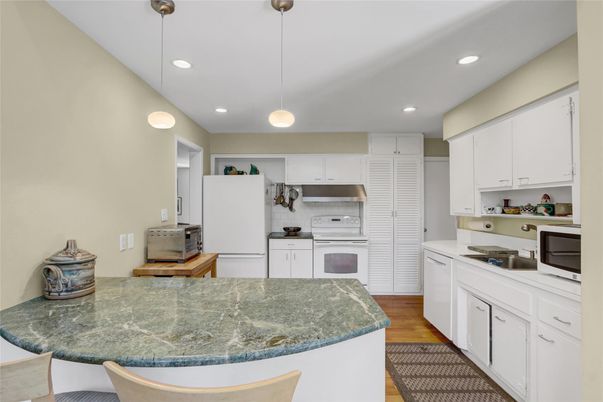 Interior, Kitchen, Pendant Lights, Recessed Lighting, Stainless Steel Appliances, Wood Texture Flooring