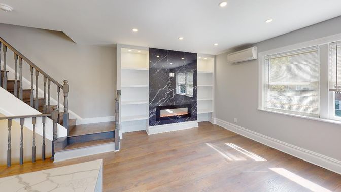 Fireplace, Interior, Marble Walls, Recessed Lighting, Wood Texture Flooring