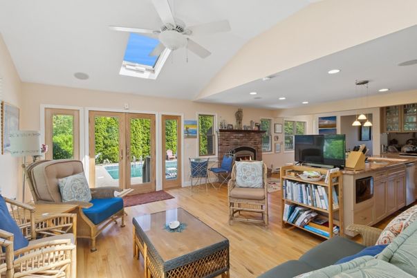 Dining room, Fireplace, Interior, Living room, Pendant Lights, Recessed Lighting, Wood Texture Flooring