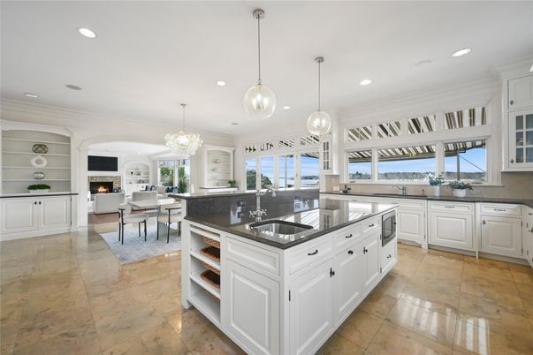 Chandelier, Dining room, Fireplace, Interior, Kitchen, Living room, Pendant Lights, Recessed Lighting, Water