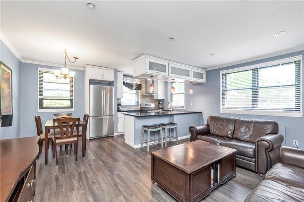 Dining room, Interior, Kitchen, Living room, Pendant Lights, Recessed Lighting, Stainless Steel Appliances, Wood Texture Flooring