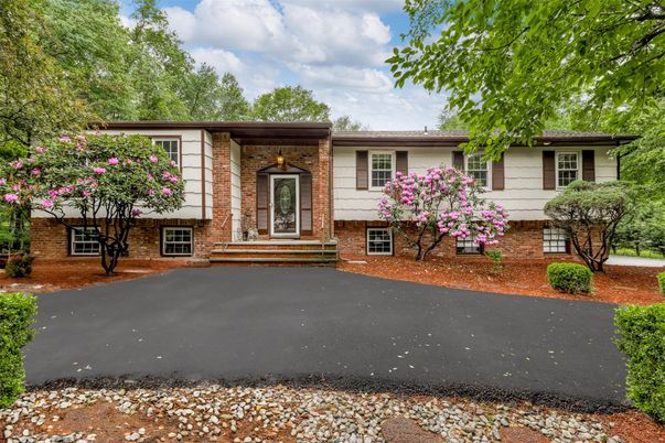 Exterior, Facade, Brick Facade, Raised Ranch