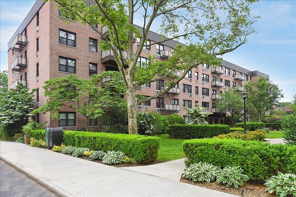 Exterior, Facade, Brick Facade, Condo Building