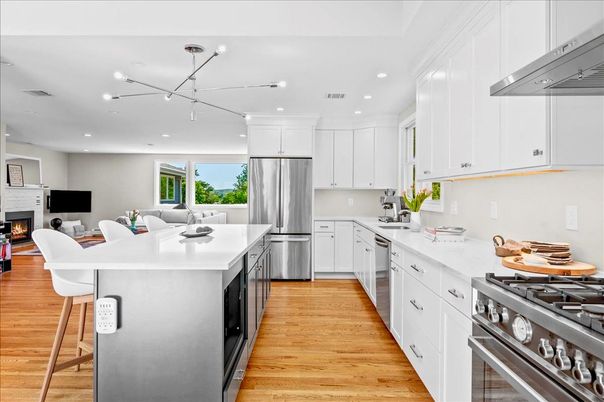 Fireplace, Interior, Kitchen, Pendant Lights, Recessed Lighting, Stainless Steel Appliances, Wood Texture Flooring