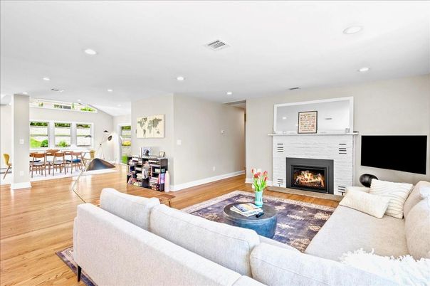 Dining room, Fireplace, Interior, Living room, Recessed Lighting, Wood Texture Flooring