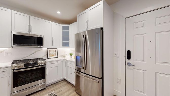 Interior, Kitchen, Recessed Lighting, Stainless Steel Appliances, Wood Texture Flooring