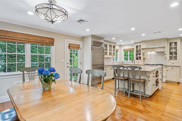 Dining room, Interior, Kitchen, Recessed Lighting, Stainless Steel Appliances, Wood Texture Flooring