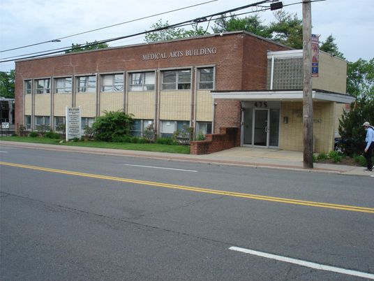 Exterior, Facade, Brick Facade, Condo Building
