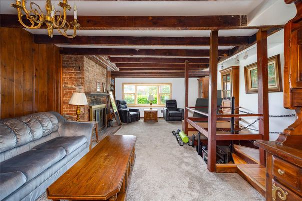 Chandelier, Fireplace, Interior, Living room, Stone Walls, Wooden Beams