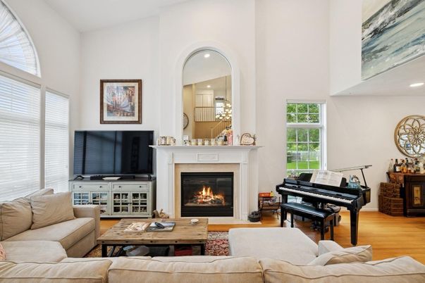 Fireplace, Interior, Living room, Piano, Recessed Lighting, Wood Texture Flooring