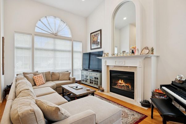 Fireplace, Interior, Living room, Piano, Recessed Lighting, Wood Texture Flooring