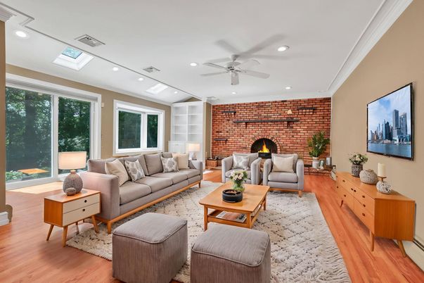 Fireplace, Interior, Living room, Recessed Lighting, Stone Walls, Wood Texture Flooring