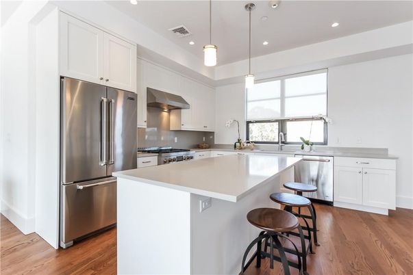 Interior, Kitchen, Pendant Lights, Recessed Lighting, Stainless Steel Appliances, Wood Texture Flooring