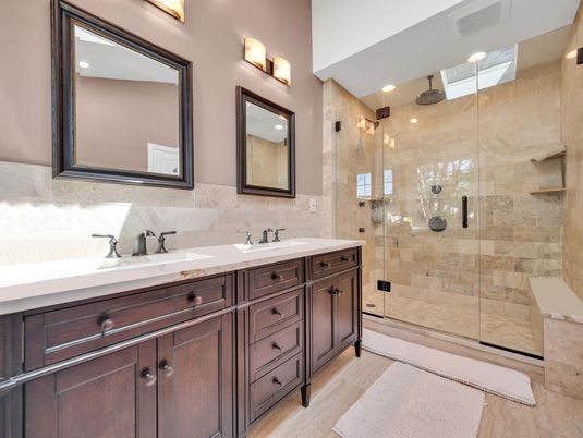 Bathroom, Dual Sink Vanities, Glass Shower, Interior, Recessed Lighting, Wood Texture Flooring