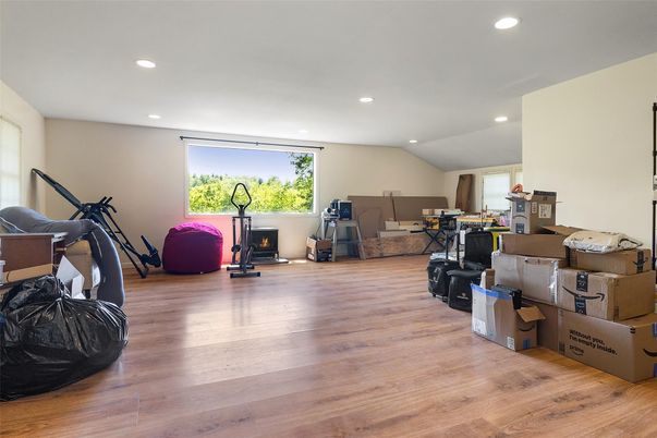 Fireplace, Fitness Equipment, Interior, Recessed Lighting, Wood Texture Flooring