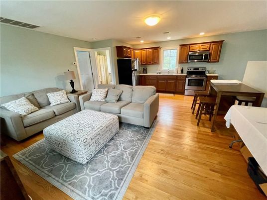 Dining room, Interior, Kitchen, Living room, Recessed Lighting, Stainless Steel Appliances, Wood Texture Flooring