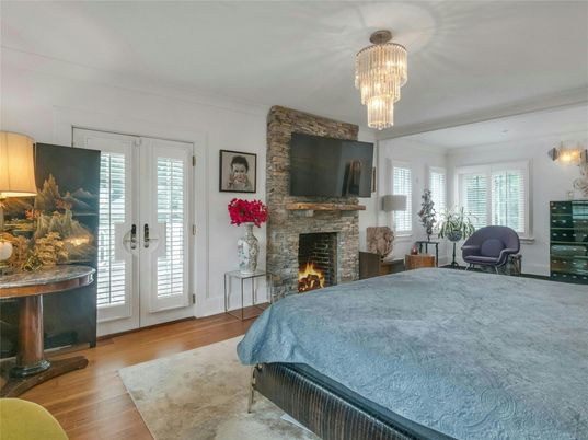Bedroom, Chandelier, Fireplace, Interior, Wood Texture Flooring