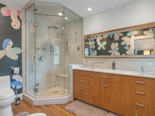 Bathroom, Dual Sink Vanities, Glass Shower, Interior, Recessed Lighting, Wood Texture Flooring