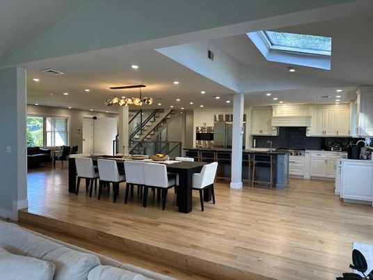Chandelier, Dining room, Glass Ceilings, Interior, Kitchen, Pendant Lights, Recessed Lighting, Stainless Steel Appliances, Wood Texture Flooring