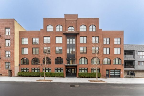 Exterior, Facade, Brick Facade, Condo Building