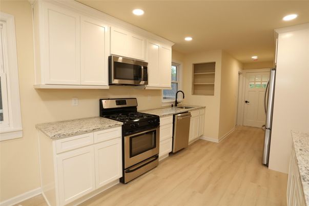 Interior, Kitchen, Recessed Lighting, Stainless Steel Appliances, Wood Texture Flooring