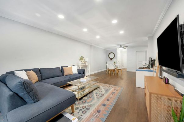 Dining room, Fireplace, Interior, Living room, Recessed Lighting, Wood Texture Flooring