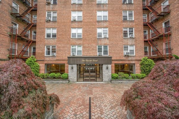 Exterior, Facade, Brick Facade, Condo Building