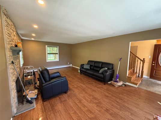 Fireplace, Interior, Recessed Lighting, Stone Walls, Wood Texture Flooring