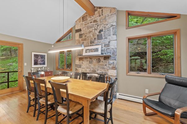 Dining room, Fireplace, Interior, Pendant Lights, Stone Walls, Wooden Beams, Wood Texture Flooring