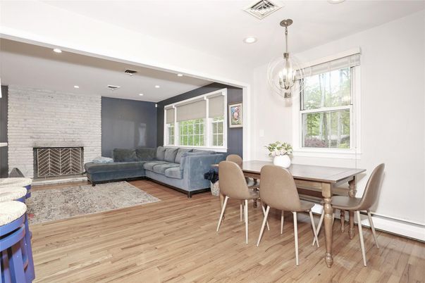 Dining room, Fireplace, Interior, Living room, Pendant Lights, Recessed Lighting, Stone Walls, Wood Texture Flooring