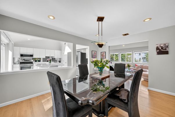 Dining room, Interior, Kitchen, Living room, Pendant Lights, Recessed Lighting, Stainless Steel Appliances, Wood Texture Flooring