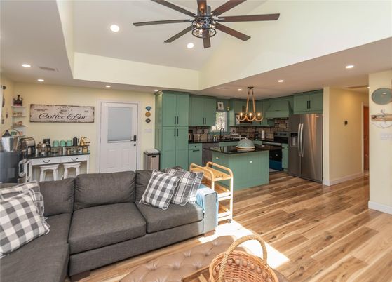 Chandelier, Interior, Kitchen, Living room, Recessed Lighting, Stainless Steel Appliances, Wood Texture Flooring