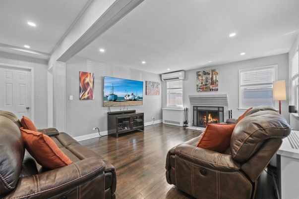 Fireplace, Interior, Living room, Recessed Lighting, Wood Texture Flooring