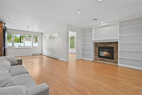 Empty room, Fireplace, Interior, Living room, Recessed Lighting, Wood Texture Flooring